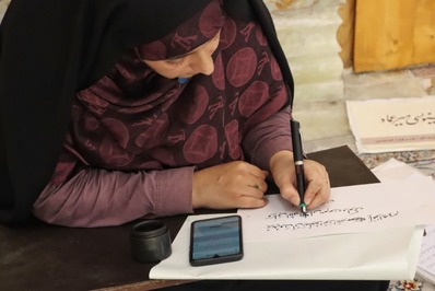 کتابت آیاتی از کلام وحی در محکومیت هتک حرمت قرآن در رشت انجام شد
